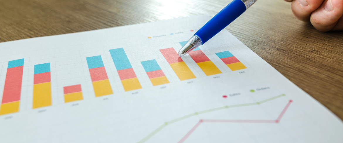 A paper with a chart and line graph, indicating startup marketing efforts being used to show traction to investors.